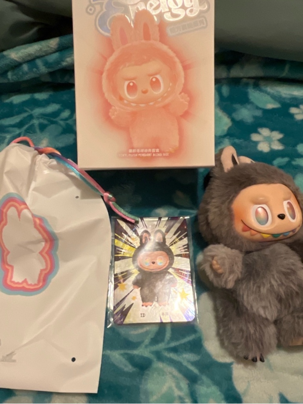 Pop Mart Gray Fuzzy Character Figure with Rainbow Face Details